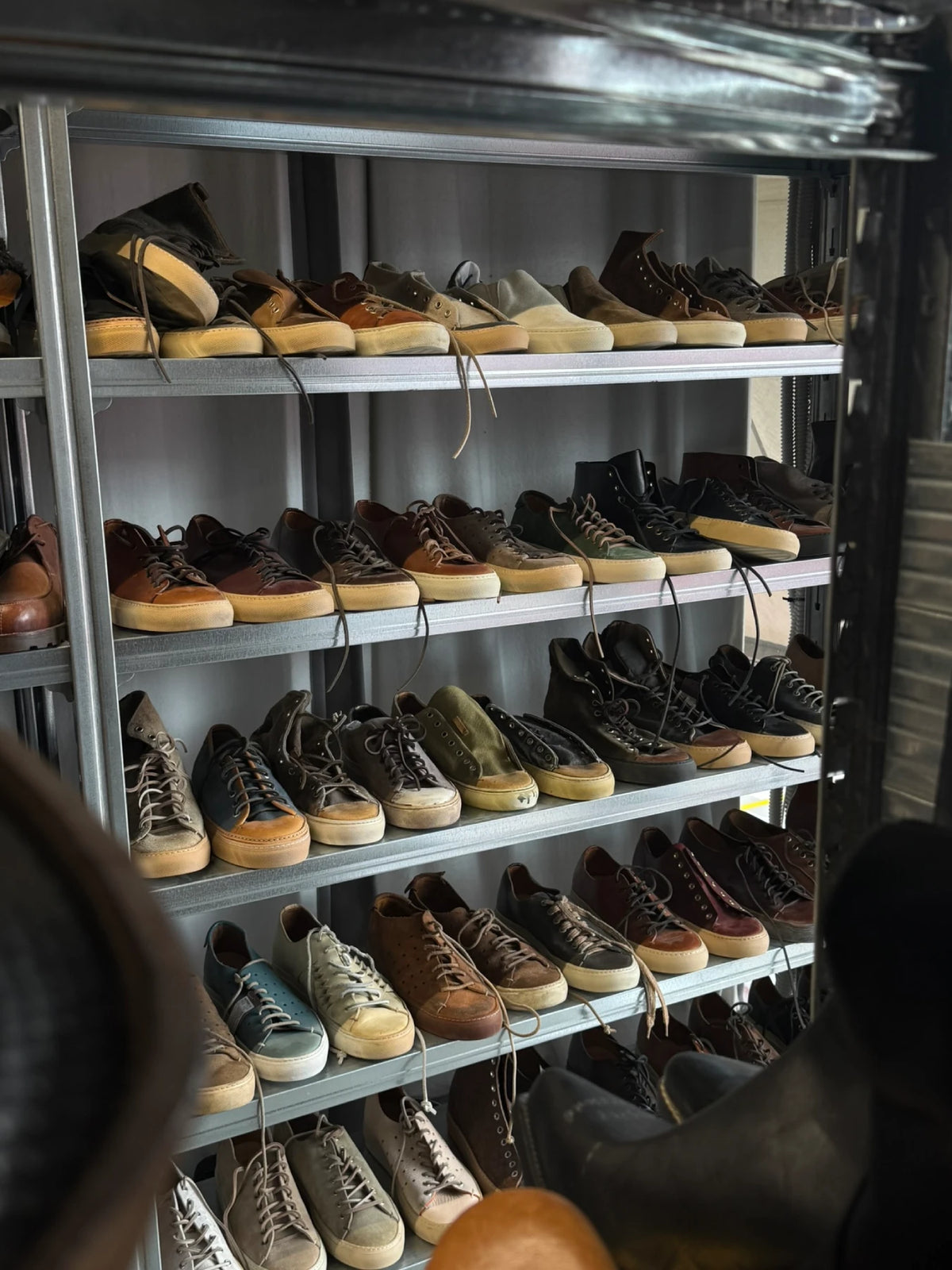 Shelves filled with Tanino sneakers in many leathers and colours
